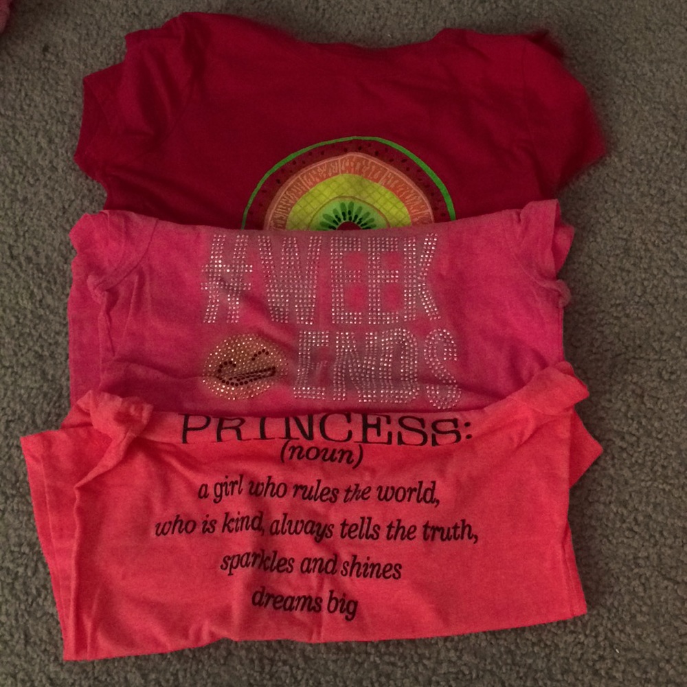 Three pink shirts